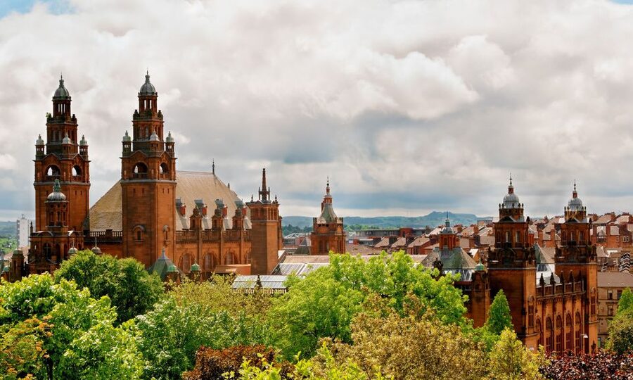 From Edinburgh: Glasgow & Scottish lakes Spanish Tour - Glasgow from the minivan or coach