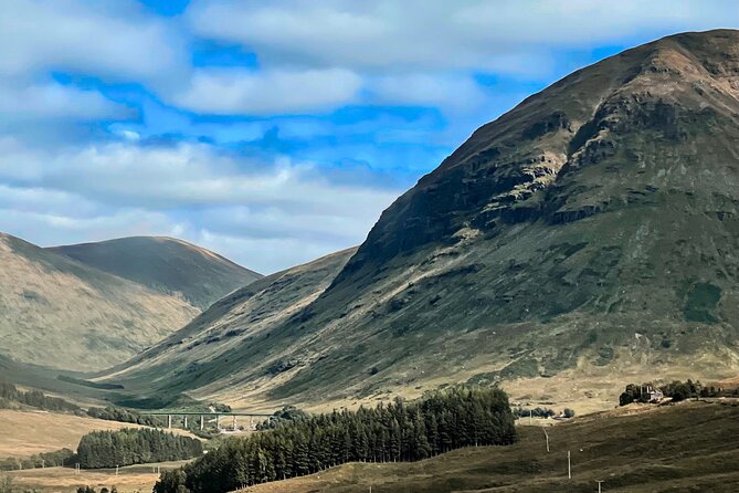 Glenfinnan Viaduct Glencoe and Fort William Tour from Edinburgh - The early route: Forth views, Perthshire, and Highland cattle
